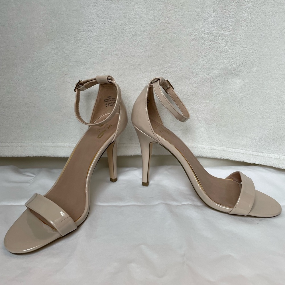 Nude faux patent leather heels